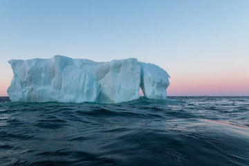 Fototapeta na wymiar Iceberg at Sunset