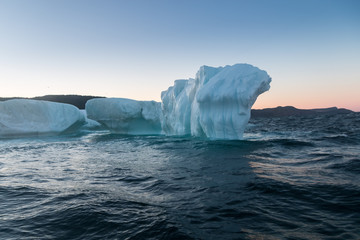 Obraz na płótnie Canvas Iceberg at Sunset