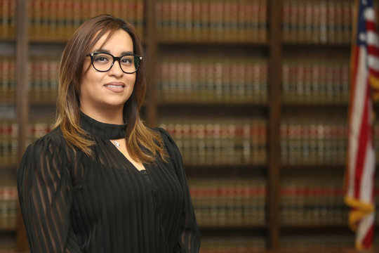 Portrait Of A Young Attractive Female Professional, Woman Lawyer In Law Office