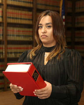 Immigration Law, Portrait of young attractive Mexican American woman lawyer