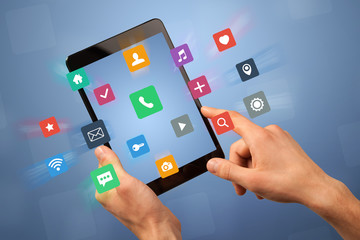 Female hand holding tablet