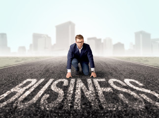 Businessman at start line