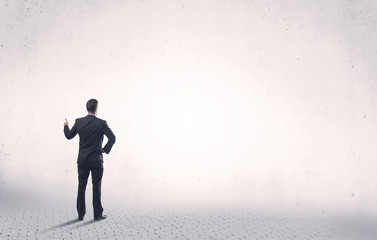 Fototapeta premium Elegant person standing with his back