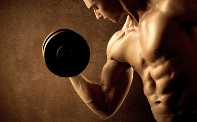 Fototapeta na wymiar Muscular fit bodybuilder athlete lifting weight