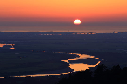 庄内平野と夕陽　Shonai plain and sunset / Sakat, Yamagata, Japan