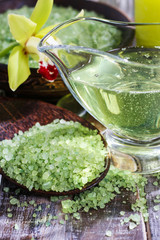 Green sea salt and liquid soap.