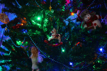 There are toys on the Christmas tree
