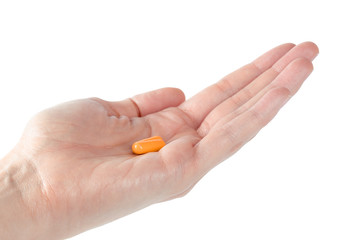 pills in woman hand