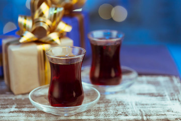 Christmas hot  tea, and light bokeh