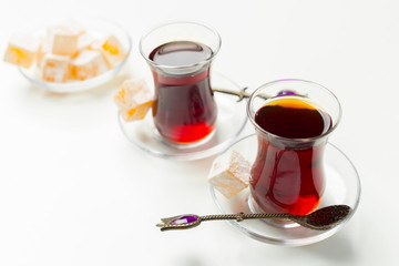 Turkish tea in traditional glass isolated on white background