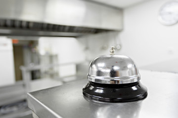 Alert bell on kitchen table in a restaurant
