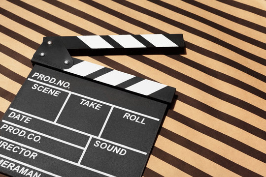 Film clapper board on a table