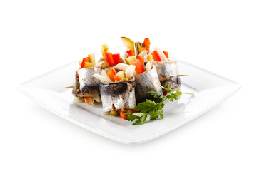 Marinated herring fillets on white background 