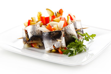 Marinated herring fillets on white background 