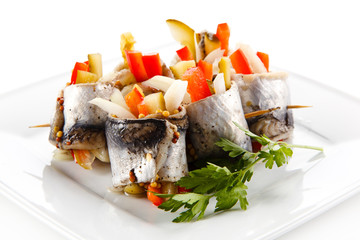 Marinated herring fillets on white background 