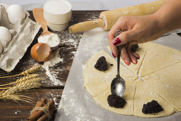 Fototapeta premium dough with close-up. man is preparing bread dough
