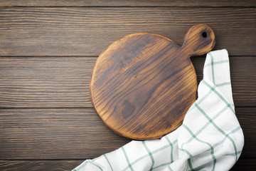 Brown wooden texture with old chopping board. Background. Top view.