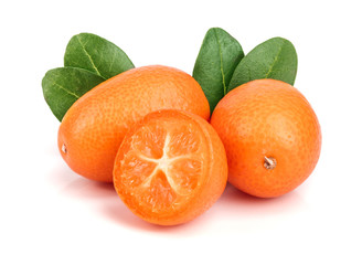 Cumquat or kumquat with leaf isolated on white background close up