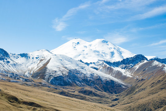 Landscape panorama Elbrus mountain with autumn hills