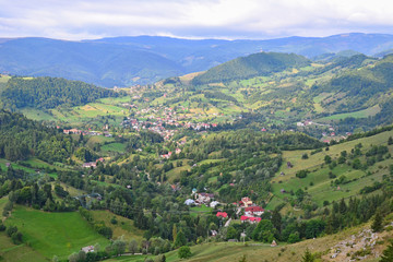 View of the Carpathians with village, Romania