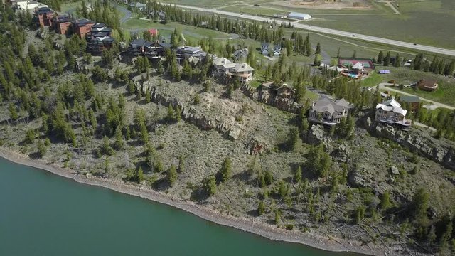 Aerial Luxury homes cliff above Lake Dillon Colorado. West of Denver. Winter and summer resort and recreation areas with many ski slopes. Tourism destination for recreation.