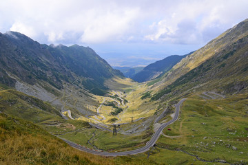 Fototapeta na wymiar Road in the mountains of Carpathians, Romania