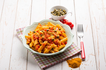 pasta with tomatoes capers and tumeric