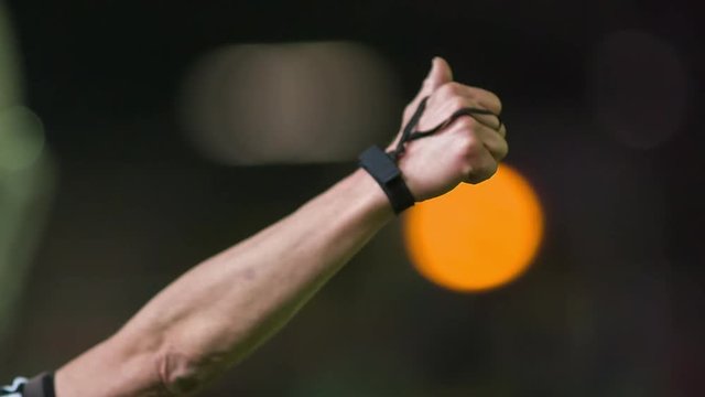 american football referee starting play