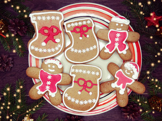christmas cookies gingerbread and decoration on wooden background