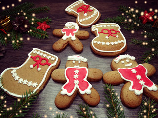 christmas cookies gingerbread and decoration on wooden background