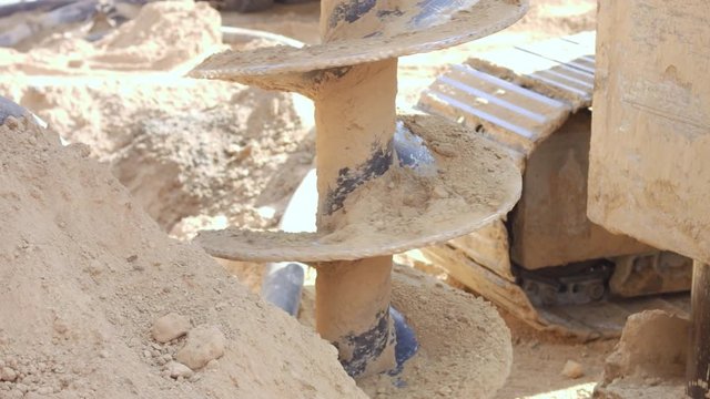 Drilling foundation well with track drill