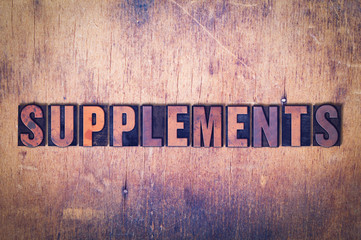 Supplements Theme Letterpress Word on Wood Background