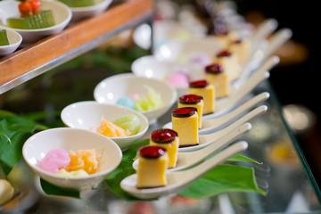 Glass shots  pastry. wedding catering food. mini canapes food.  tasty dessert. Beautiful decorate catering banquet table.  snacks and appetizers. wedding celebration