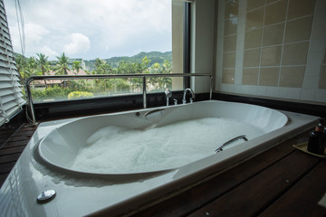 Bathtub inside the bathroom.