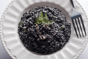 Cuttlefish ink and bogue risotto