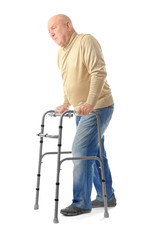 Elderly man with walking frame on white background