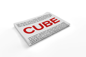 Cube on Newspaper background