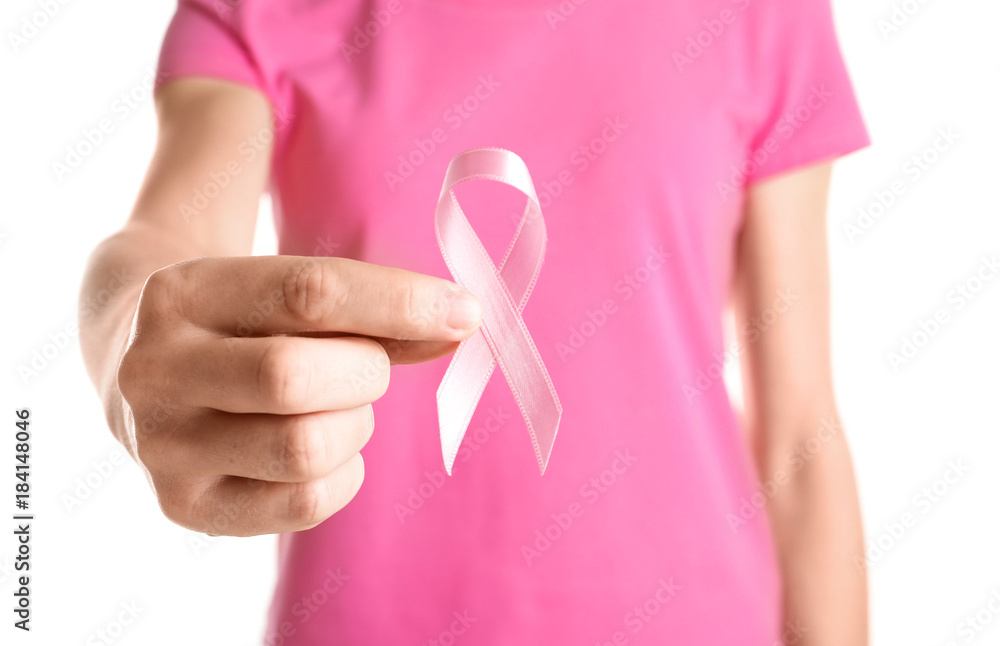 Canvas Prints Woman holding pink ribbon on white background. Breast cancer awareness concept