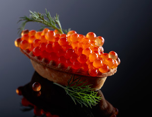 Canape with red caviar .