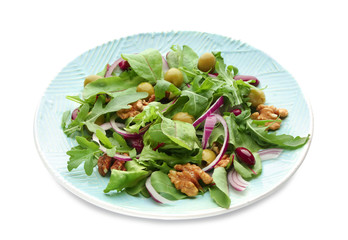 Plate with delicious vegetable salad on white background
