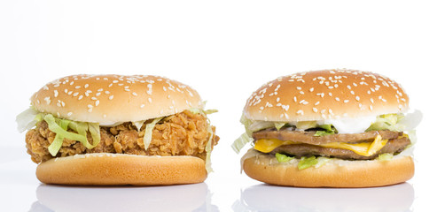 Two delicious hamburgers isolated on white background