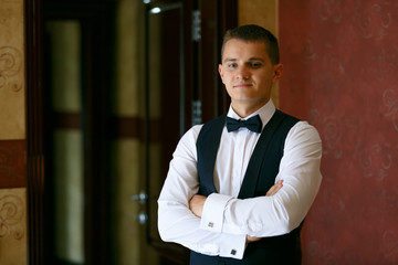 A portrait confident elegant handsome young man.