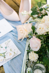 relationships, present, floral design concept. close up of large buds of light pink and delicate creamy roses, symbols of undying love, collected in the marvelous bridal bouquet