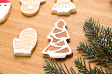 Fototapeta na wymiar Tasty Christmas homemade cookies on cutting board