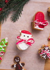 Christmas homemade gingerbread cookies on wooden table