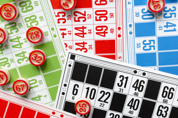 colored bingo cards with number balls