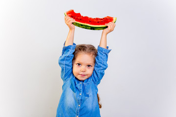 Kids eating watermelon