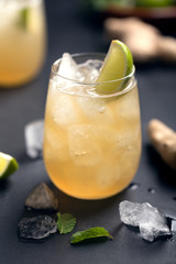 Fresh cocktail prepared with ginger beer, lime and ice