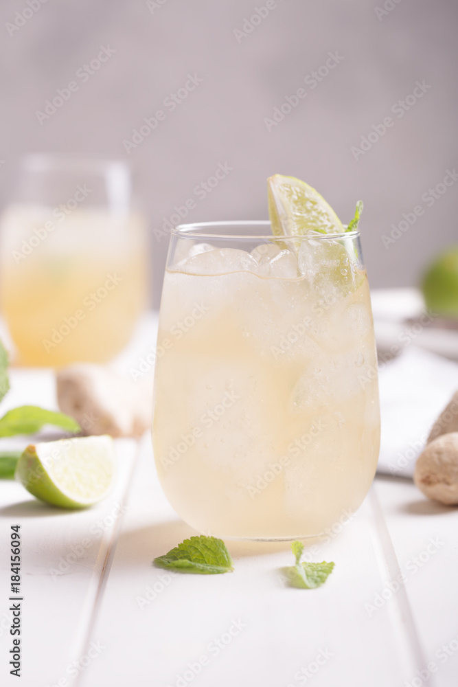 Wall mural fresh cocktail prepared with ginger beer, lime and ice