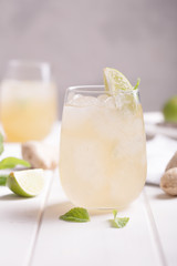 Fresh cocktail prepared with ginger beer, lime and ice